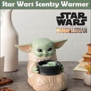 Brand new in box, baby yoda warmer